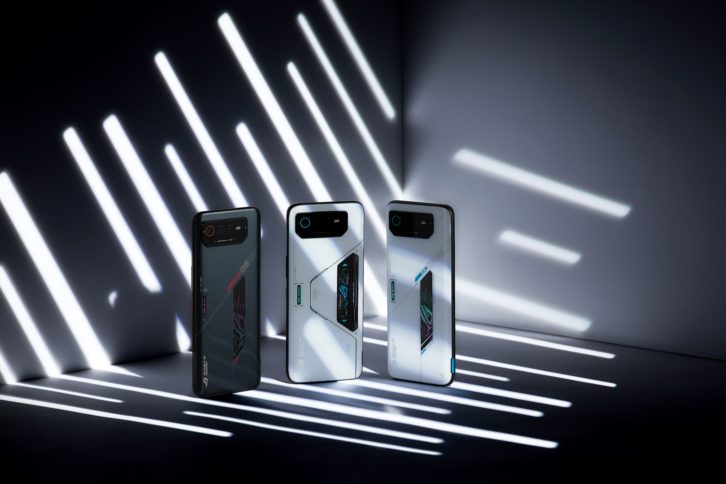 Three different Rog 6 phones stand in artistic shadows